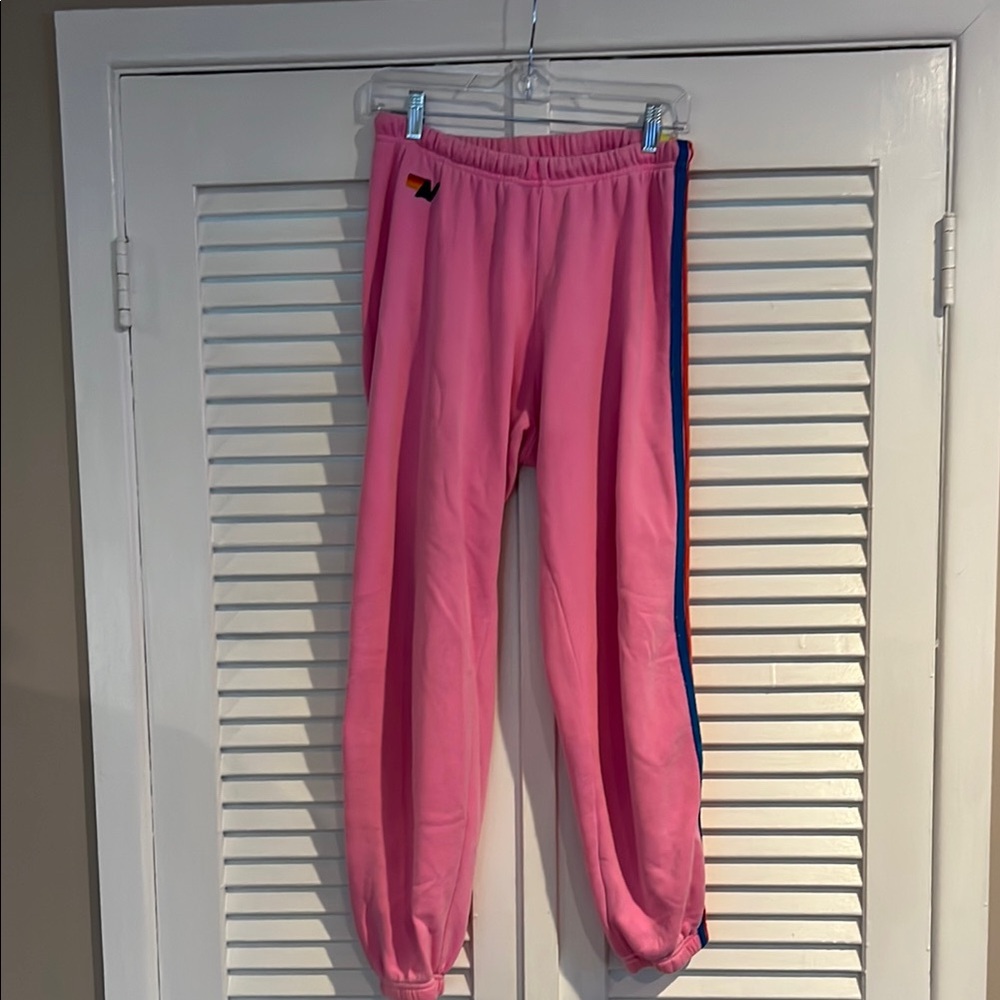 Aviator Nation pink sweatpants 5 stripe. Size L.
Pre loved